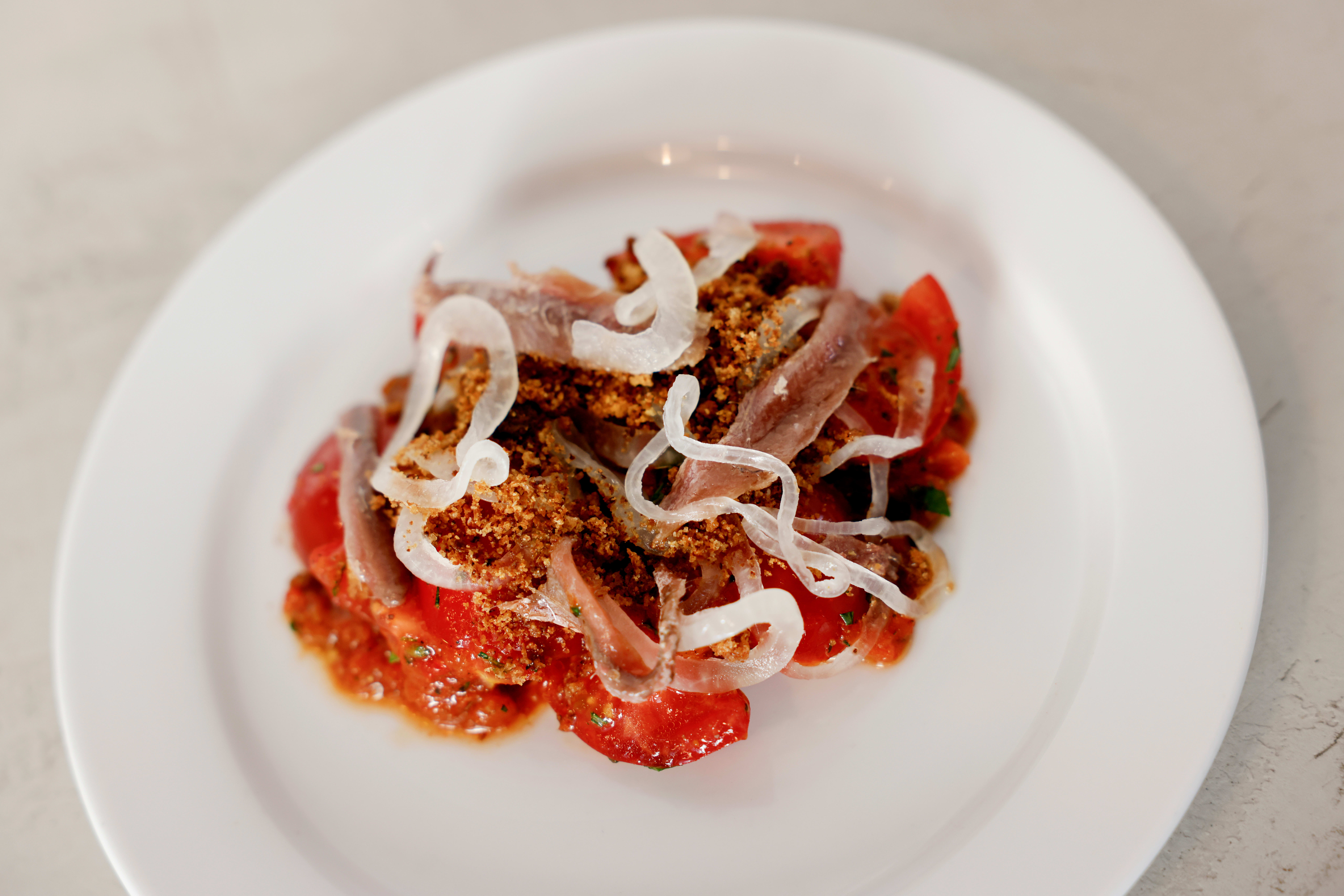 Deilig med tomater og ansjos. 