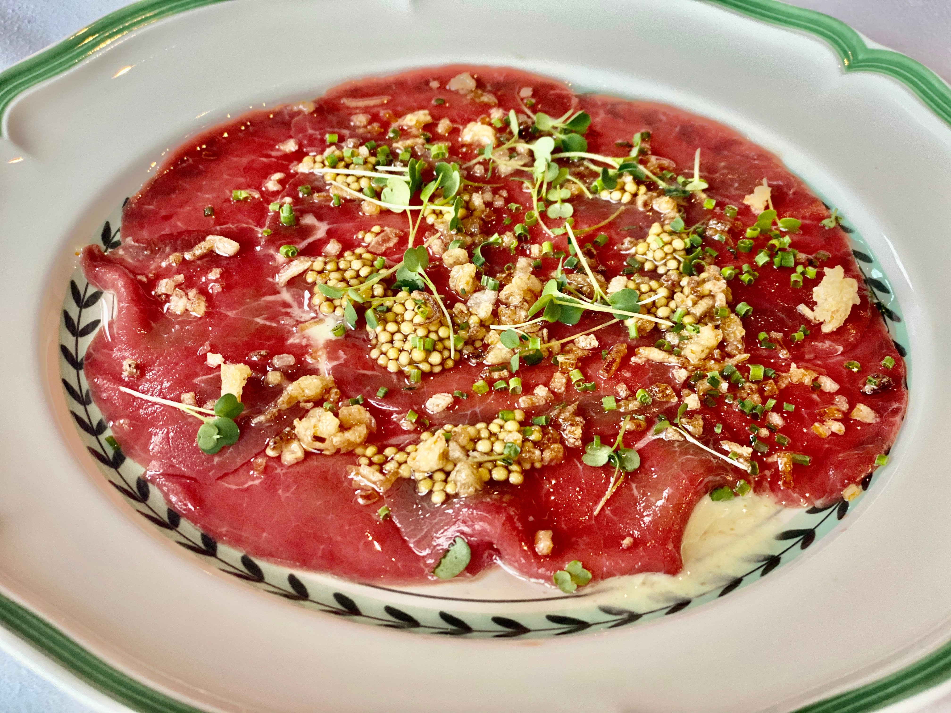 Carpaccio med litt for mye olje.