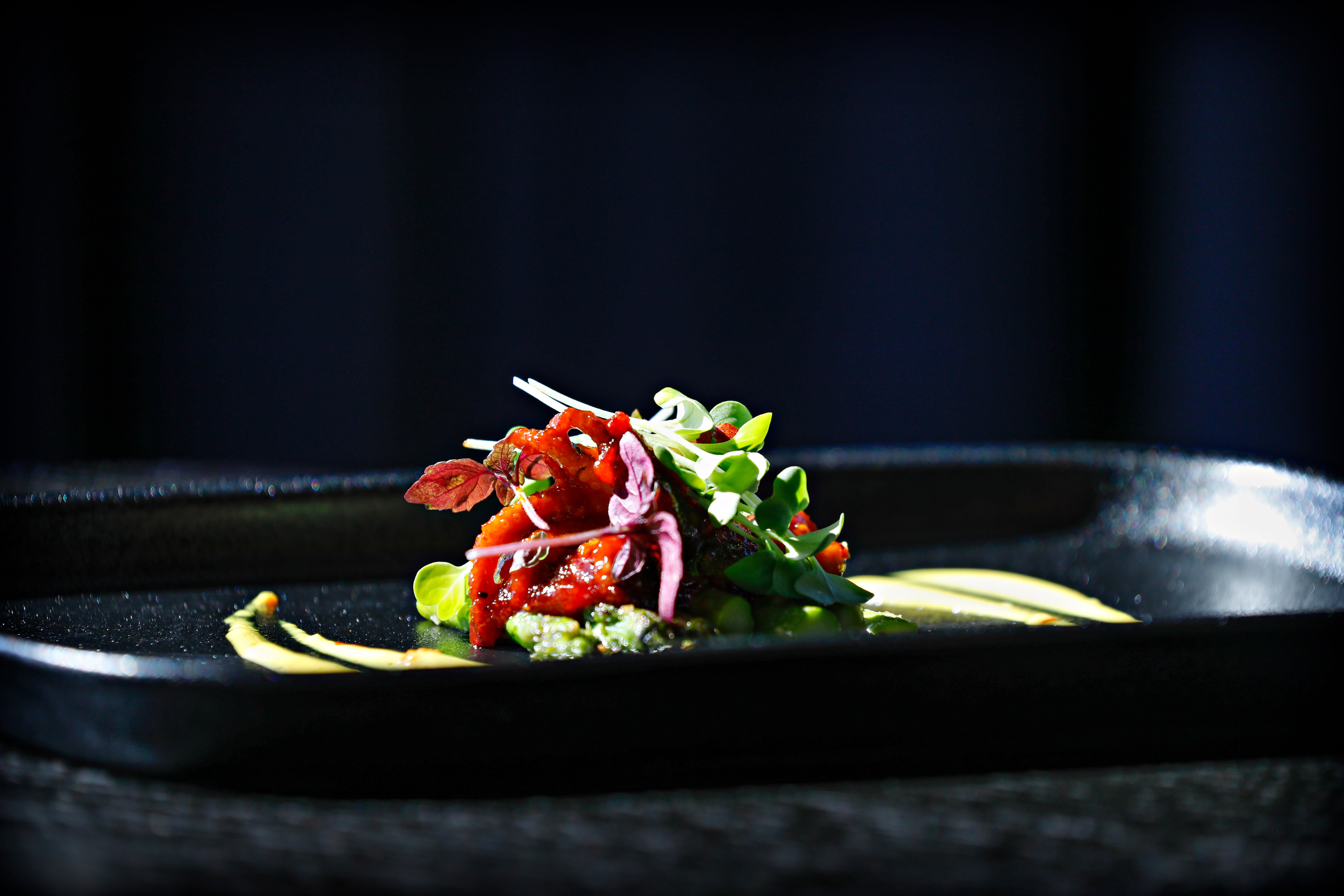 Blekksprut er en av husets egne signaturretter.