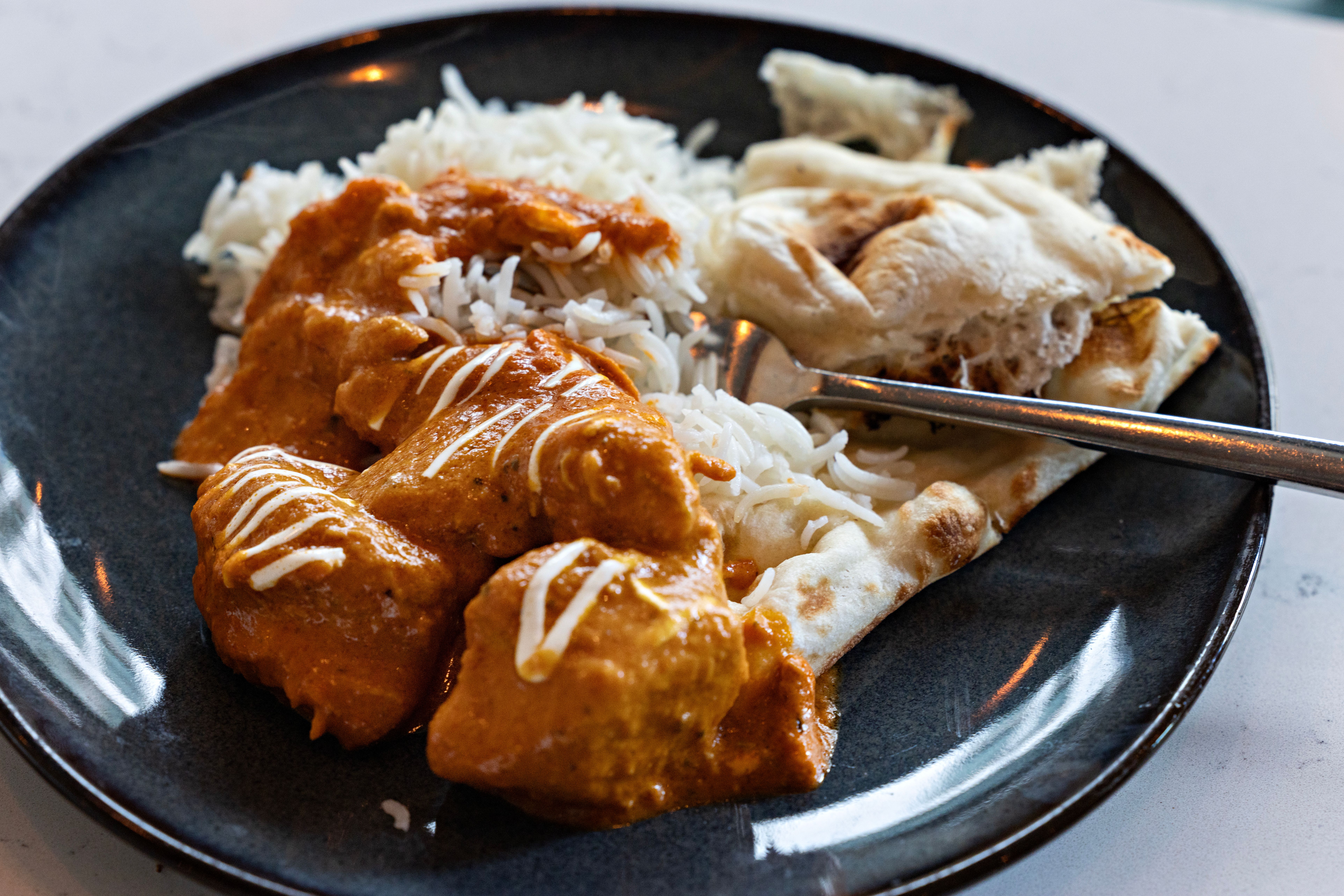 Med New Dehlis gode naan og en velkomponert curry vil de fleste bli fornøyd.