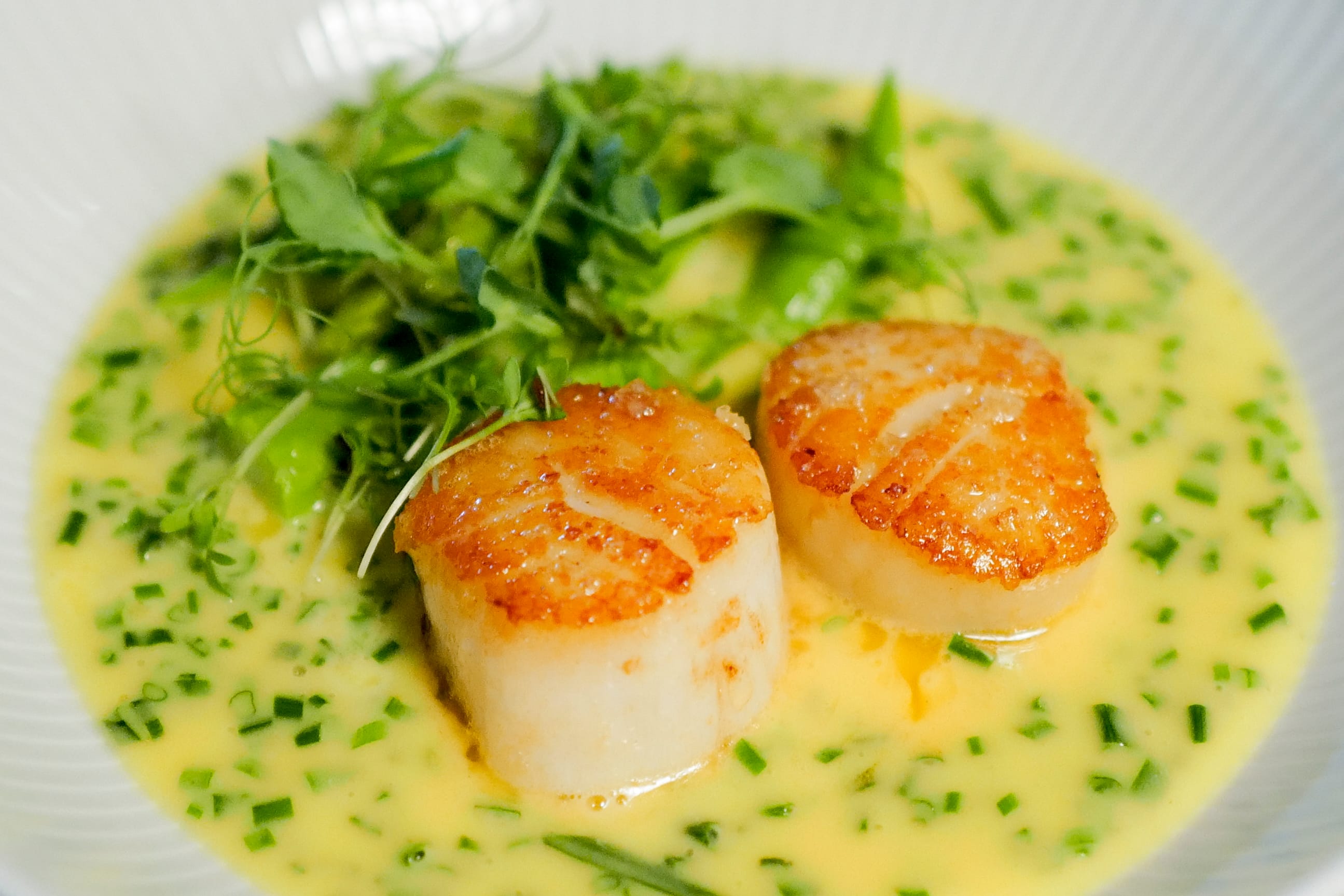 Nydelig kamskjell med Sandefjordsmør. 