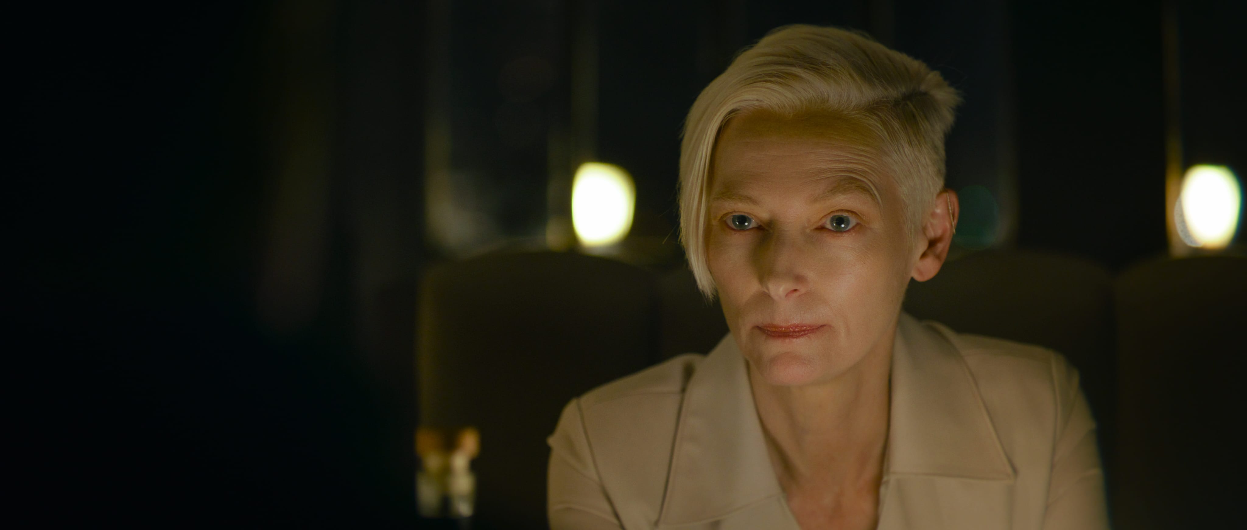 The Expert spilles av Tilda Swinton.
