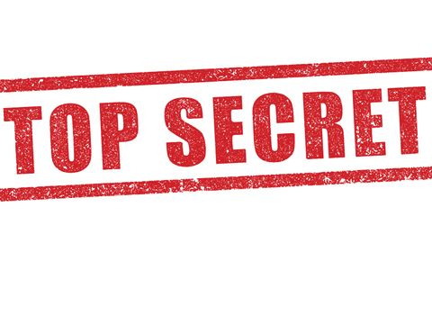 En grafikk med røde bokstaver som sier "Top Secret" er stemplet på en hvit bakgrunn. 