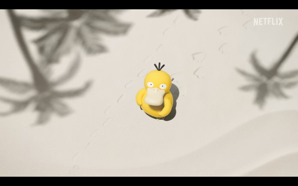 En gul figur fra en film som ser ut en and med stort nebb.