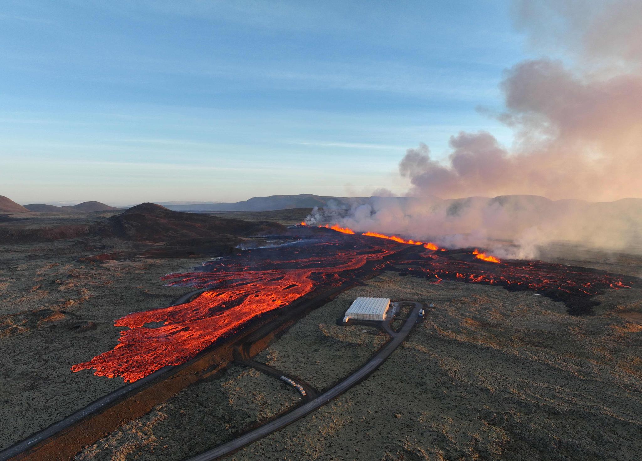 Volcanic eruption in Iceland.  Much closer to Grindavik than last time.
