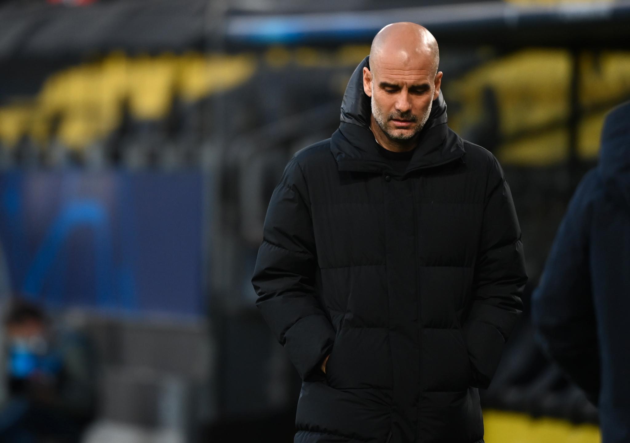 Manchester City-manager Pep Guardiola så bekymret ut da Borussia Dortmund tok ledelsen. 