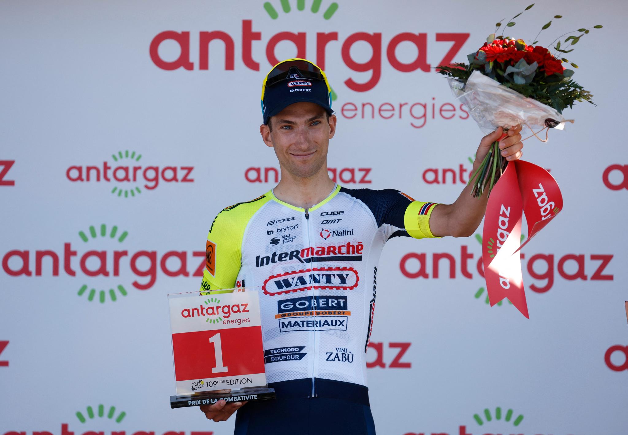 PÅ PODIET: Sven Erik Bystrøm ble kåret til etappens mest offensive rytter.