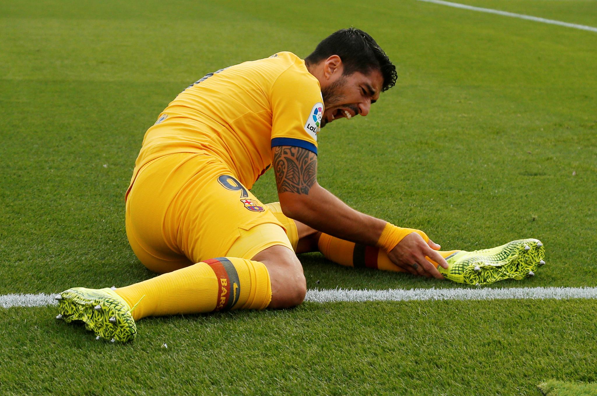  Luis Suárez måtte ut med en skade i leggen like før pause.