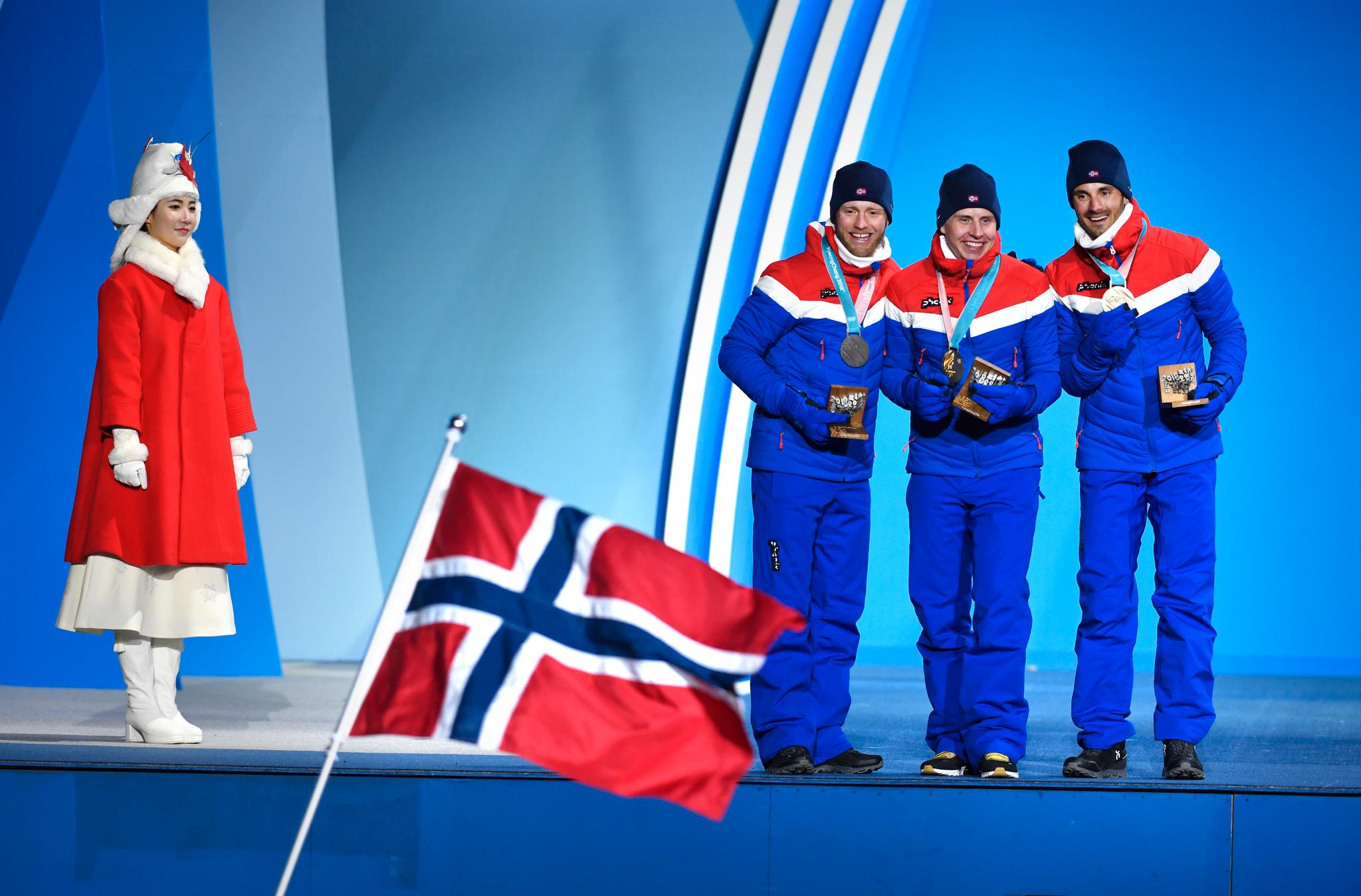OL-MEDALJE: Hans Christer Holund (t.h.) tok OL-bronse på 30 km med skibytte i Pyeongchang i 2018. Simen Hegstad Krüger (i midten) tok gullet, foran Martin Johnsrud Sundby (t.v.).